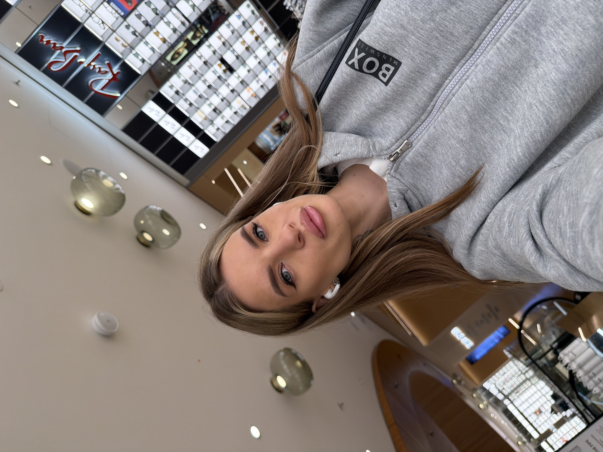 Woman takes selfie in Berlin shopping mall