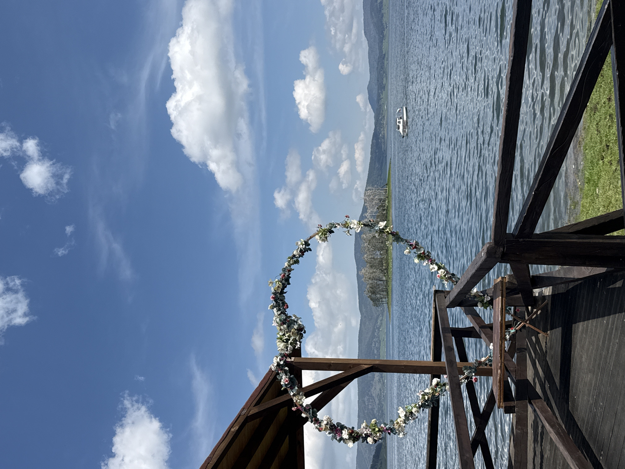 Floral decoration spotted on wooden pier in Цигов чарк, Bulgaria