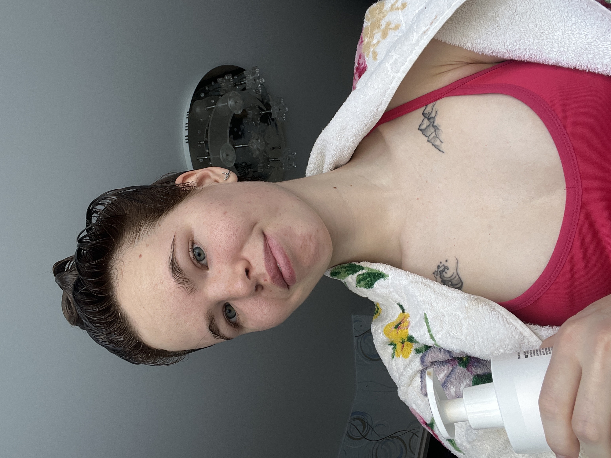 Woman documents morning routine with cat in Chaikovsky
