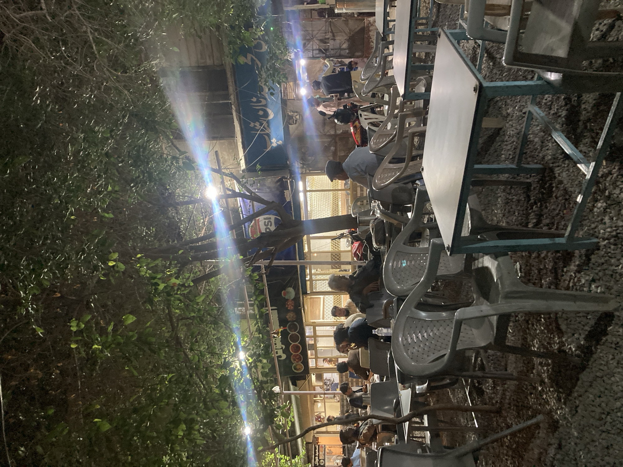 Evening dining scene captured in Quetta City outdoor area