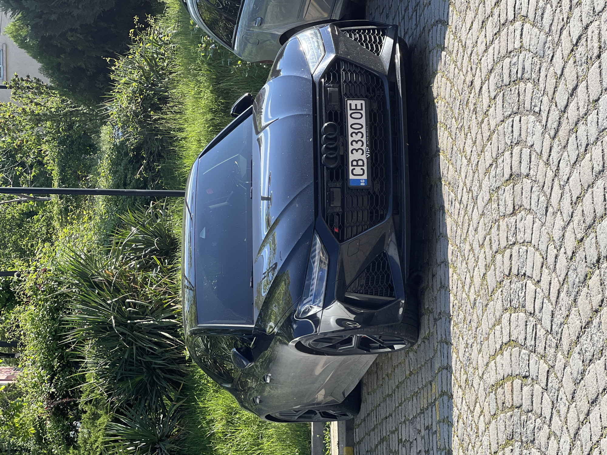 Sofia street scenes: luxury cars, broadcasting activity captured Saturday afternoon