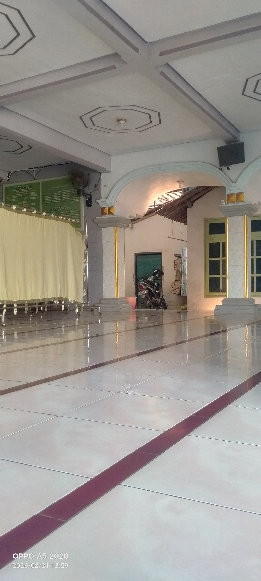 Inside and outside a mosque in Dusun Satu, Indonesia