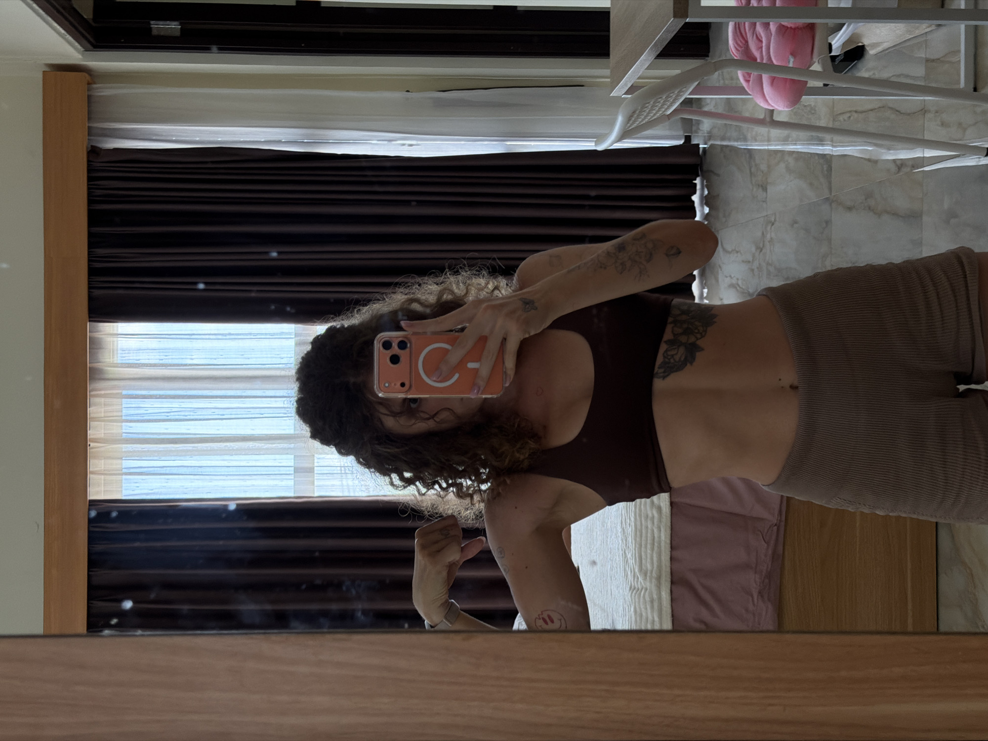 Woman documents morning workout routine in North Kuta bedroom