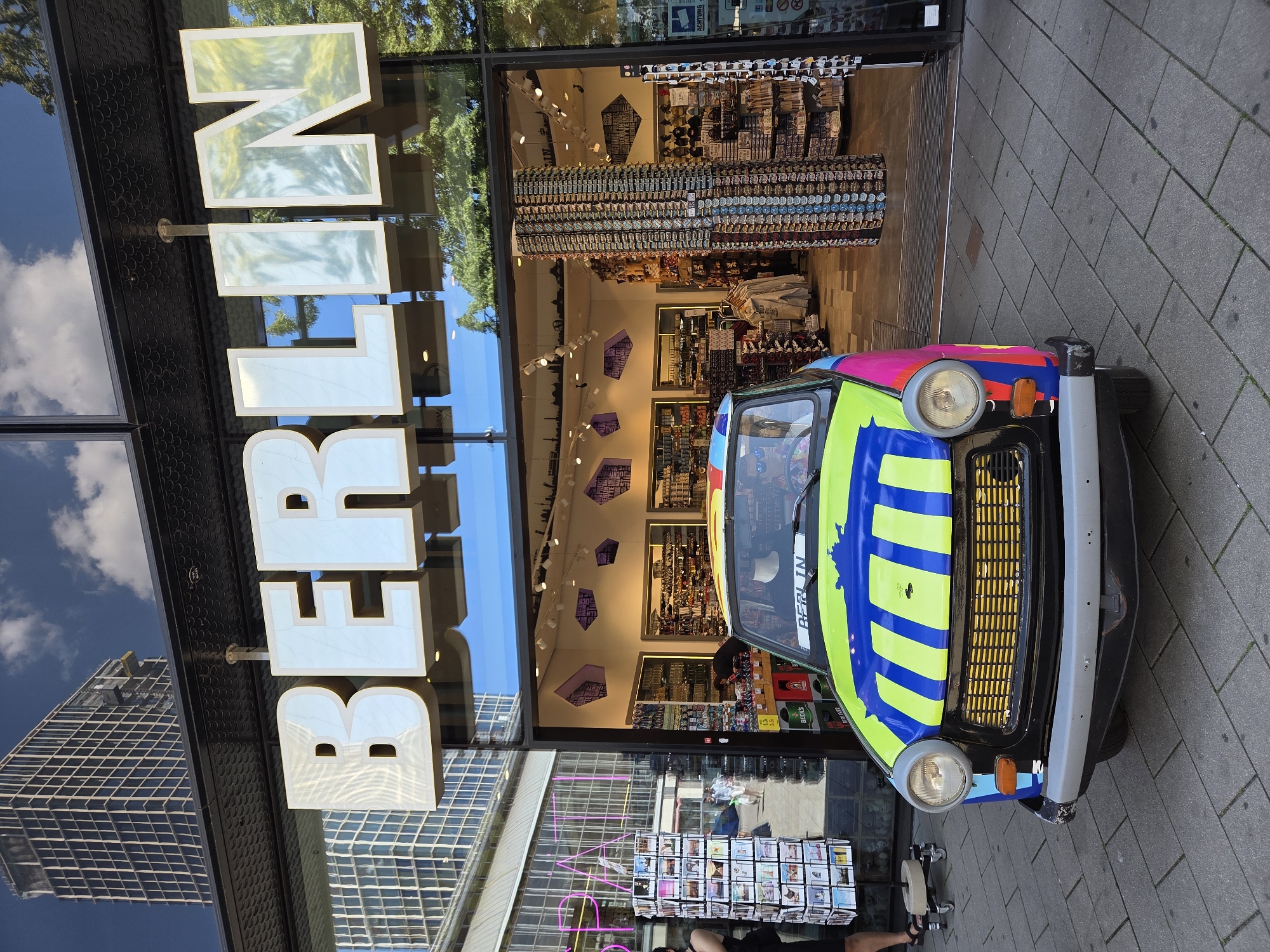 Colorful Trabant parked outside a Berlin souvenir shop