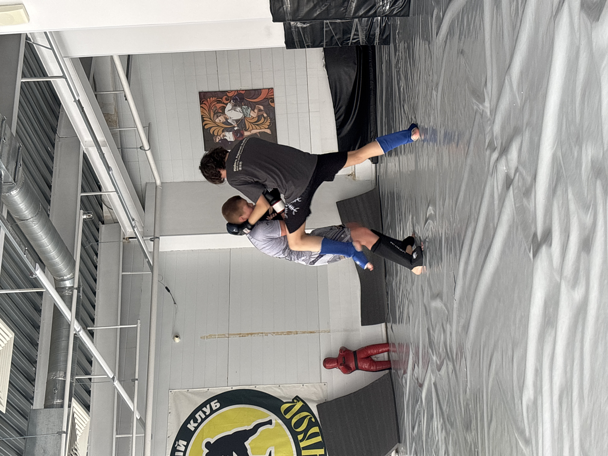 Early morning combat sports training session observed in Perm gym