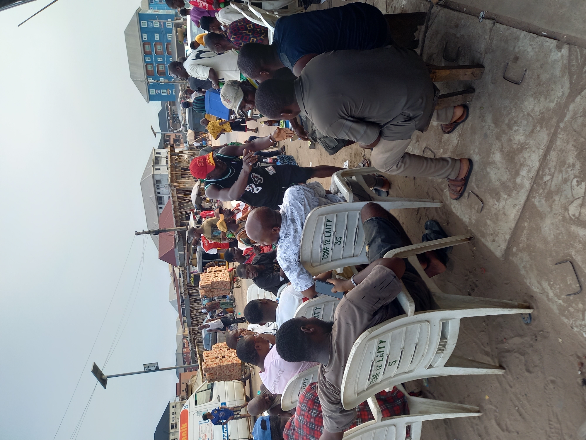 Daily life scenes documented across Onitsha markets and community