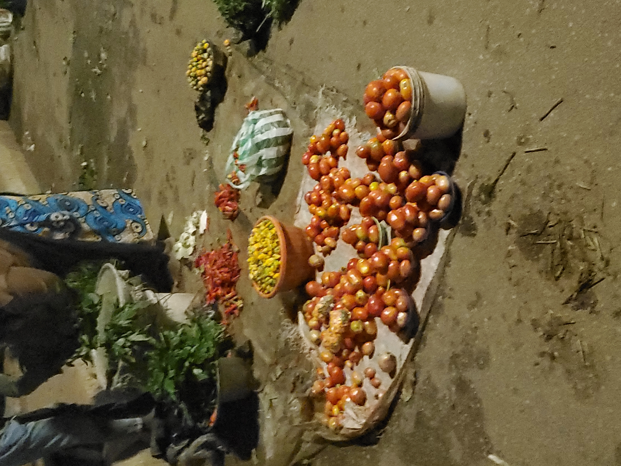 Bukuru's night market scene: grills, stalls, and street commerce