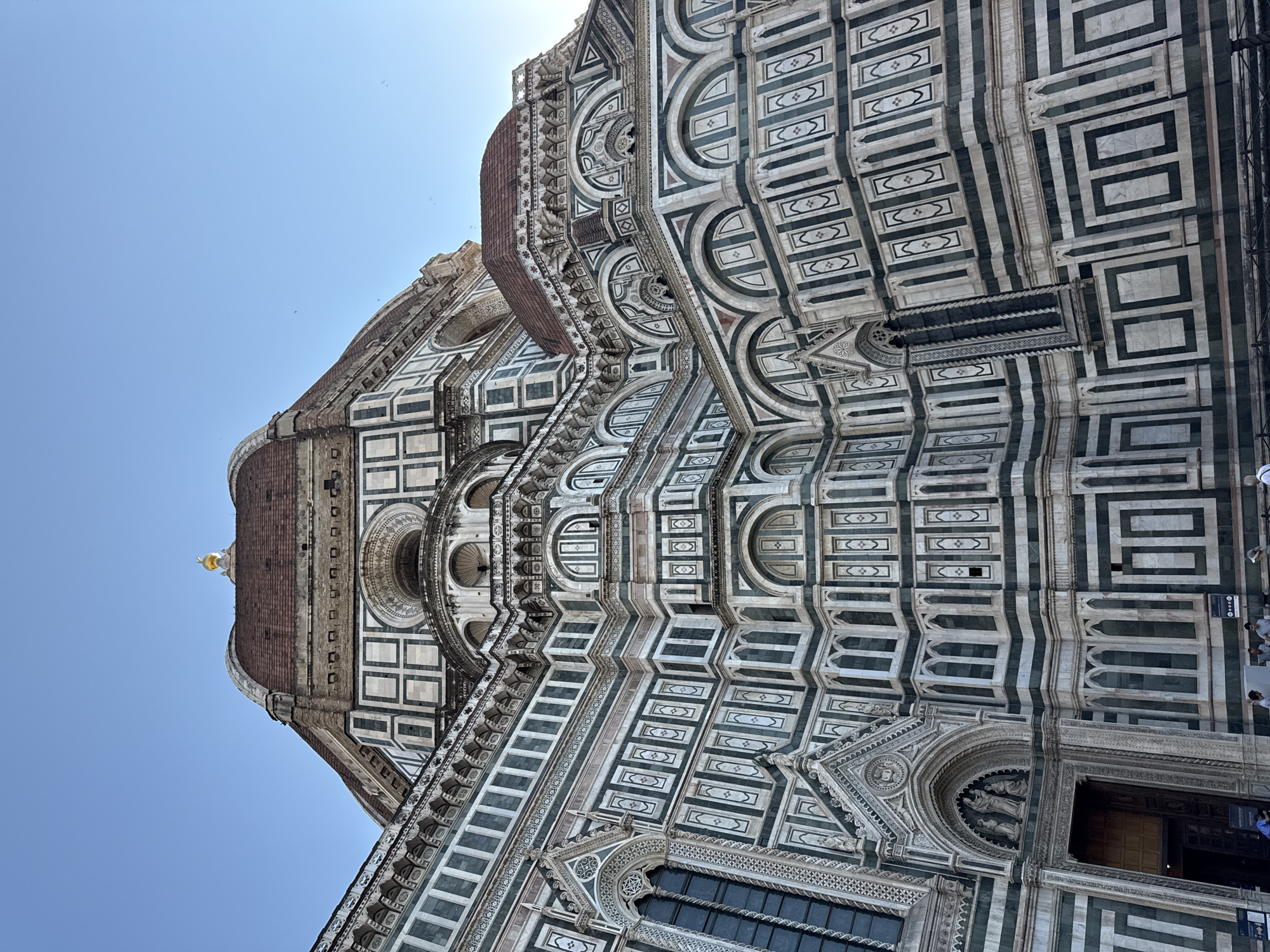 Close-up angles on Florence Cathedral's dome and marble facade