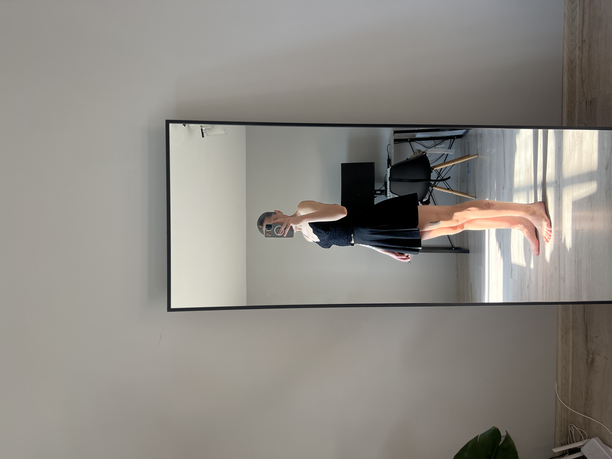 Mirror selfie in a sunlit room in Ternopil