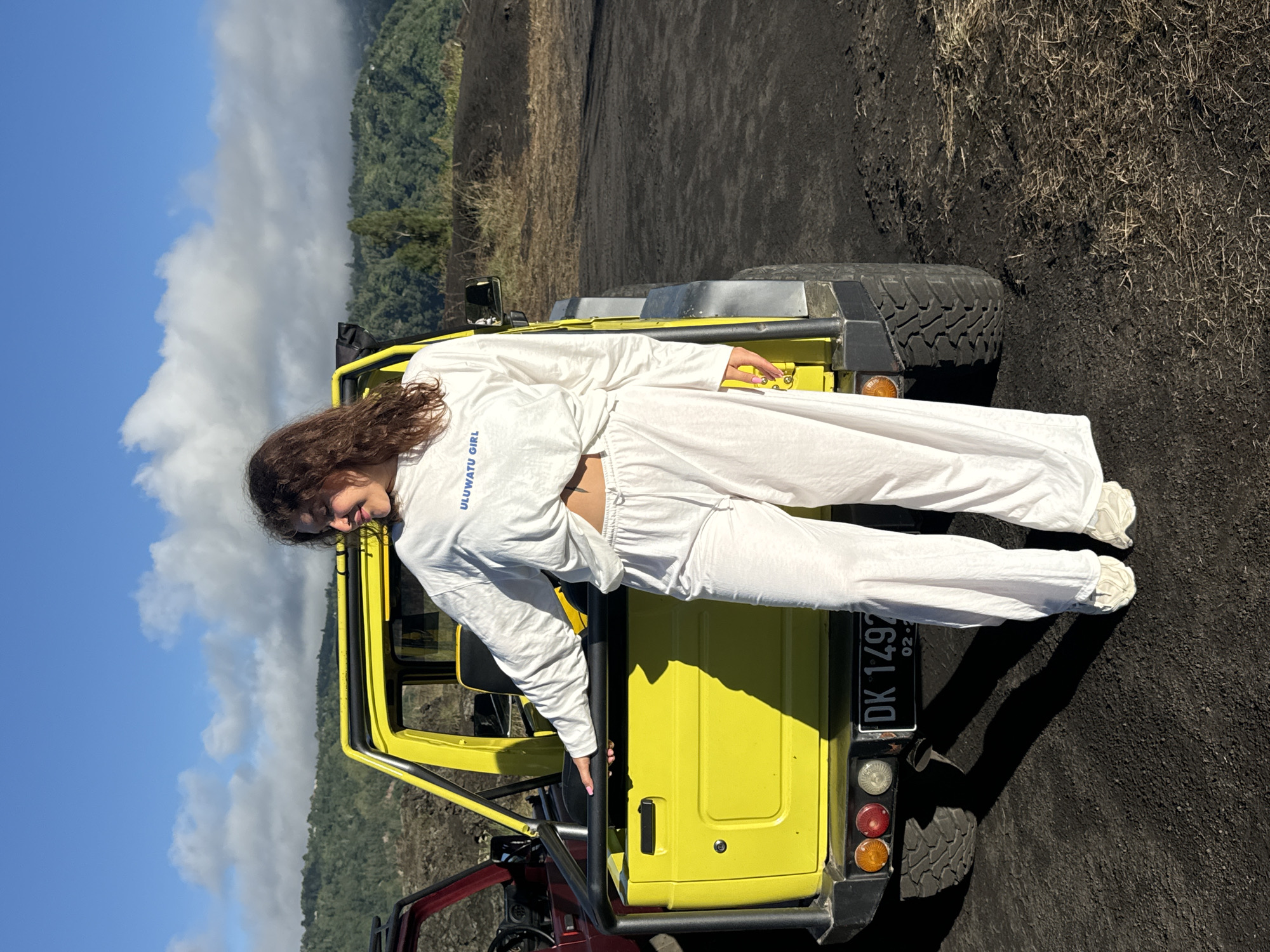 Woman in tracksuit spotted with yellow jeep in Kintamani