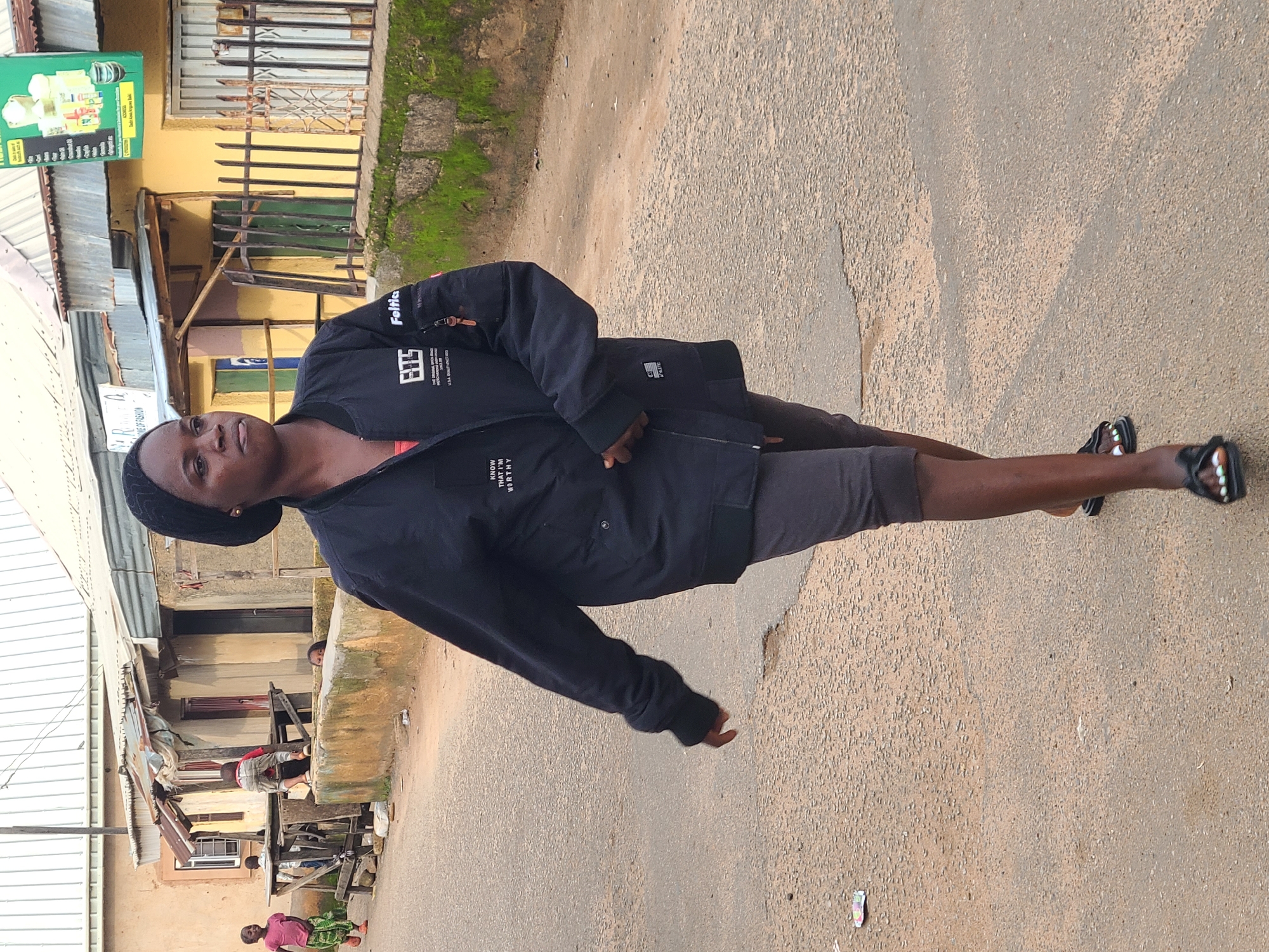 Afternoon foot traffic through Jos residential streets