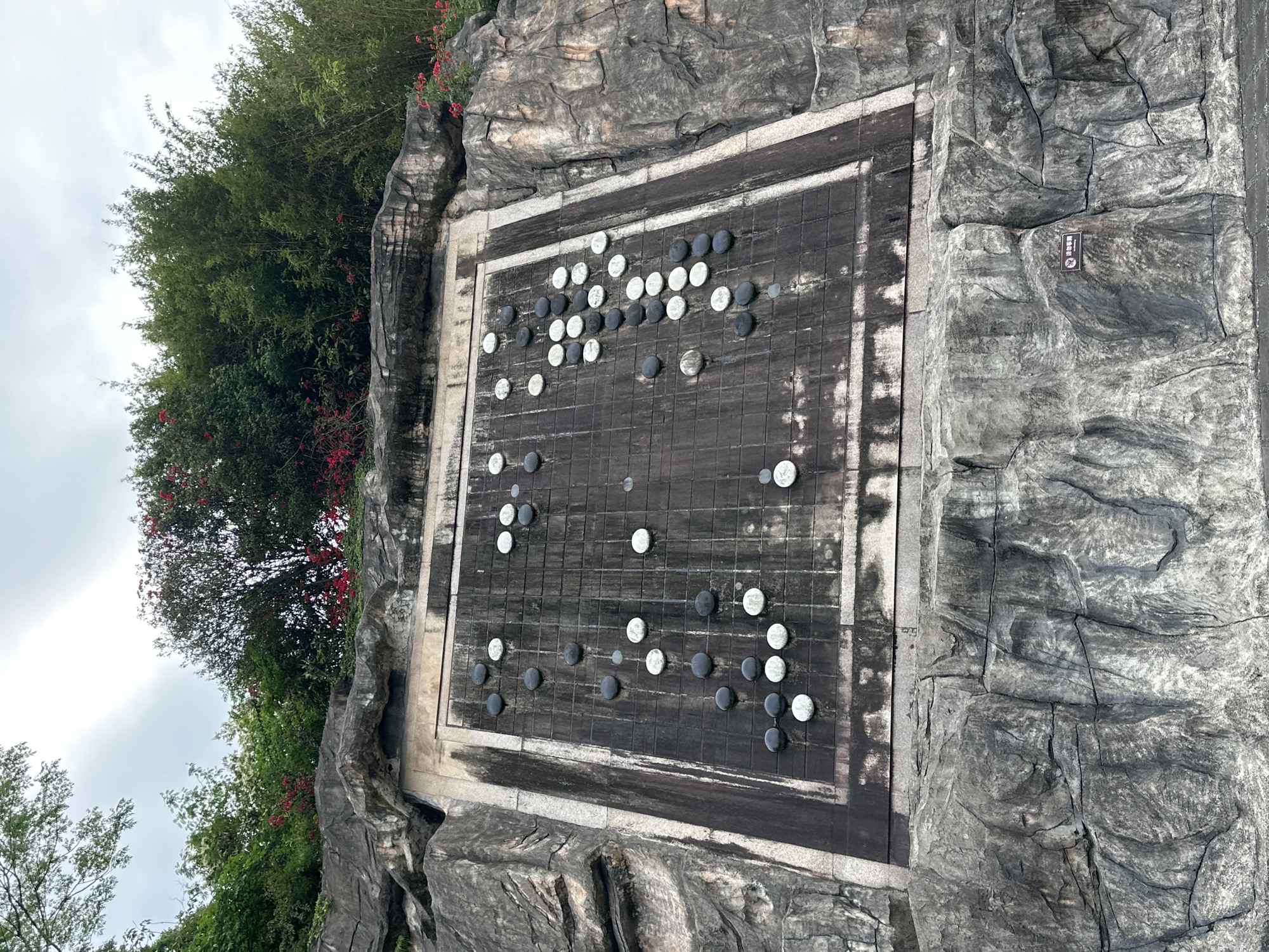 Go board spotted on rock formation in Liangjiang