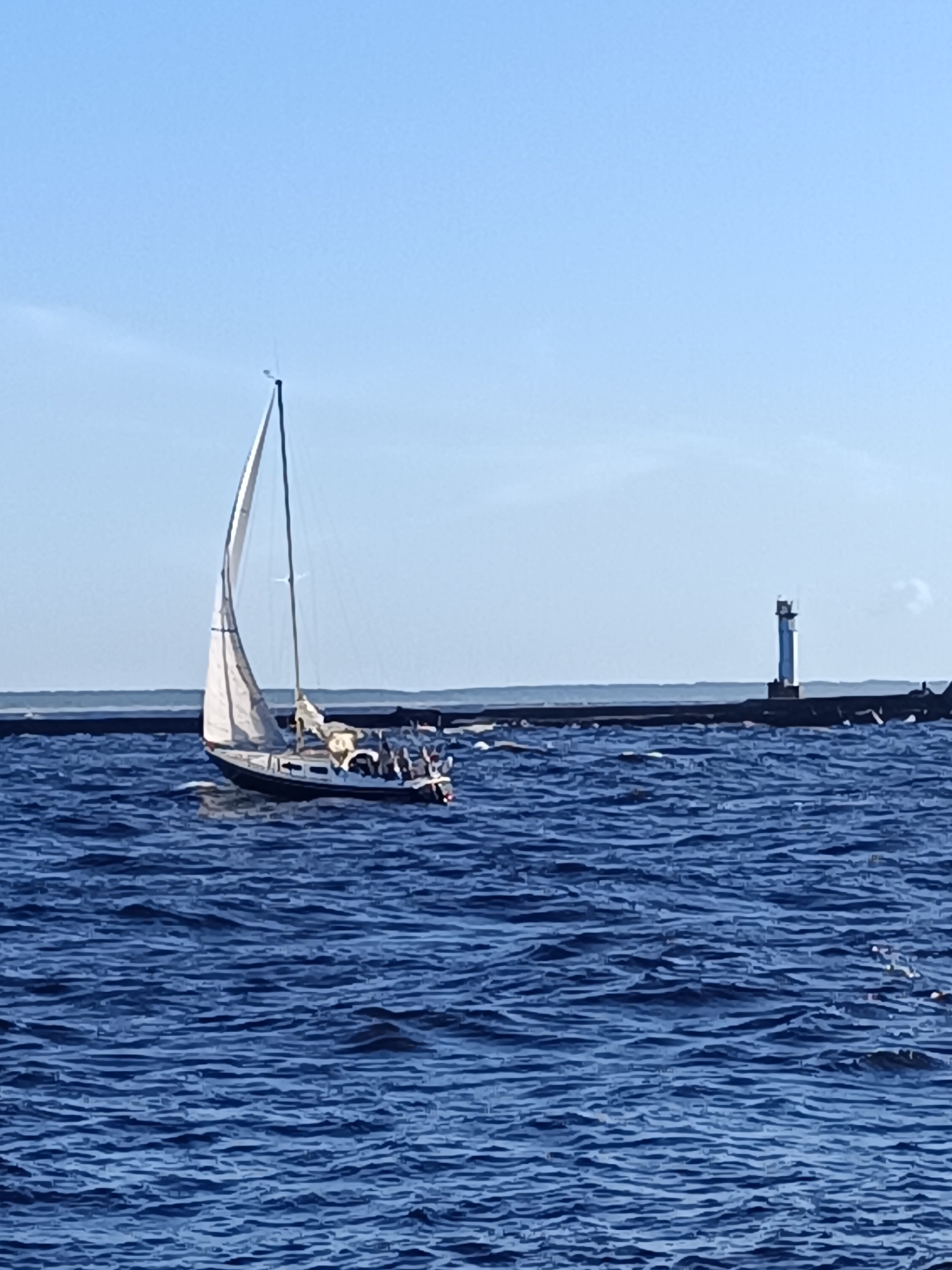 Sailboat on the Daugava River, Riga, sunny afternoon