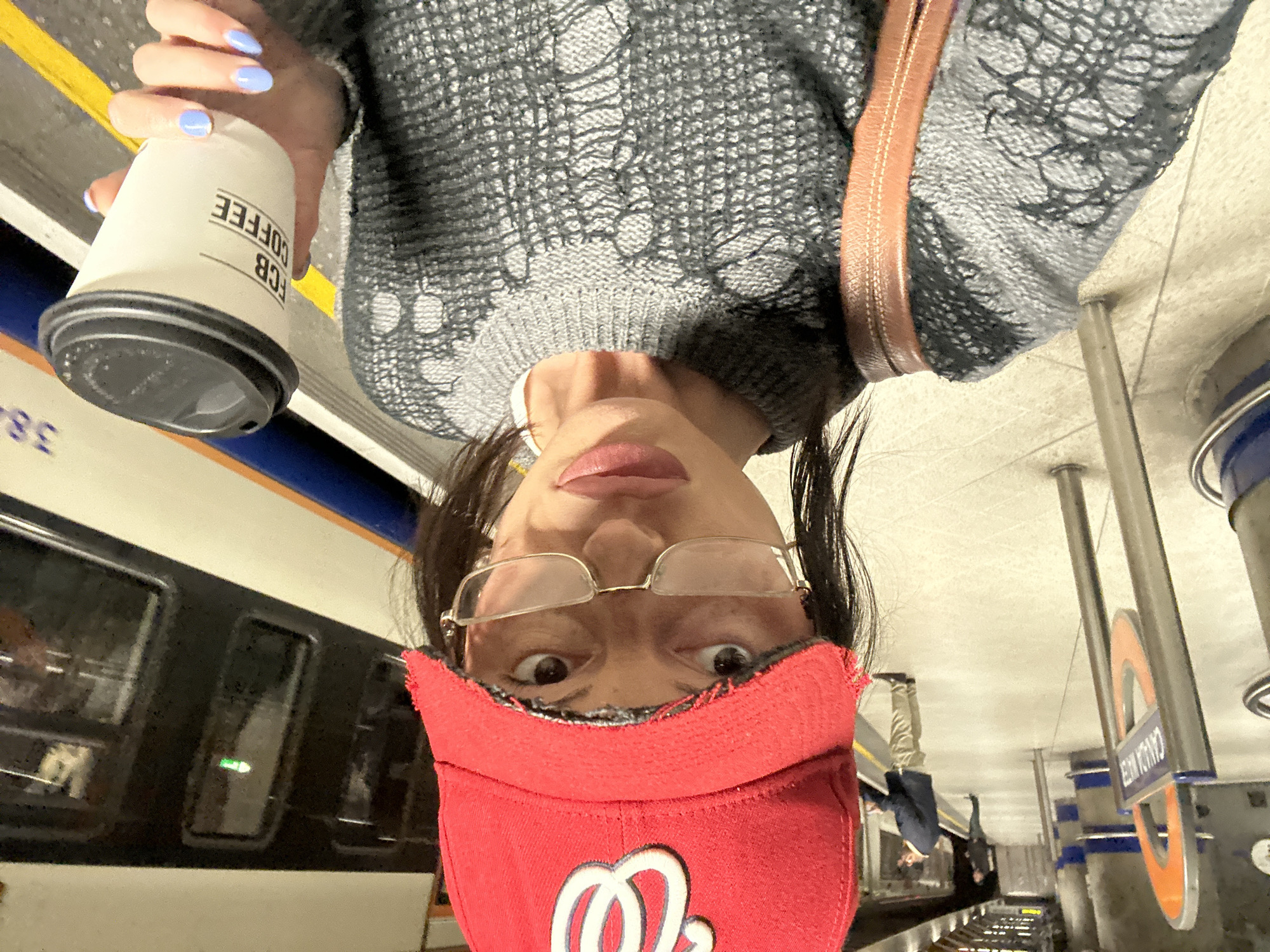 Commuter takes selfie at Camden Town Underground station