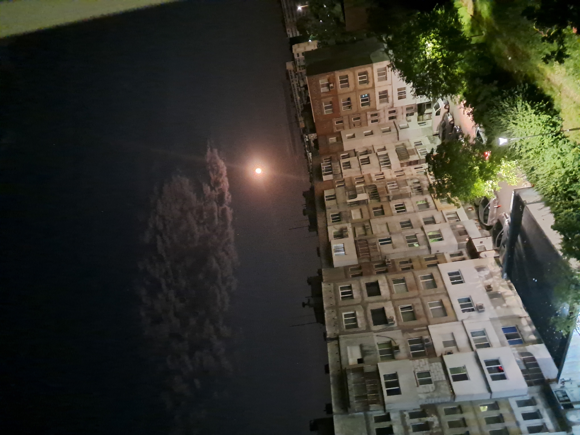 Nighttime look at a lit residential block in Gabrovo, Bulgaria.