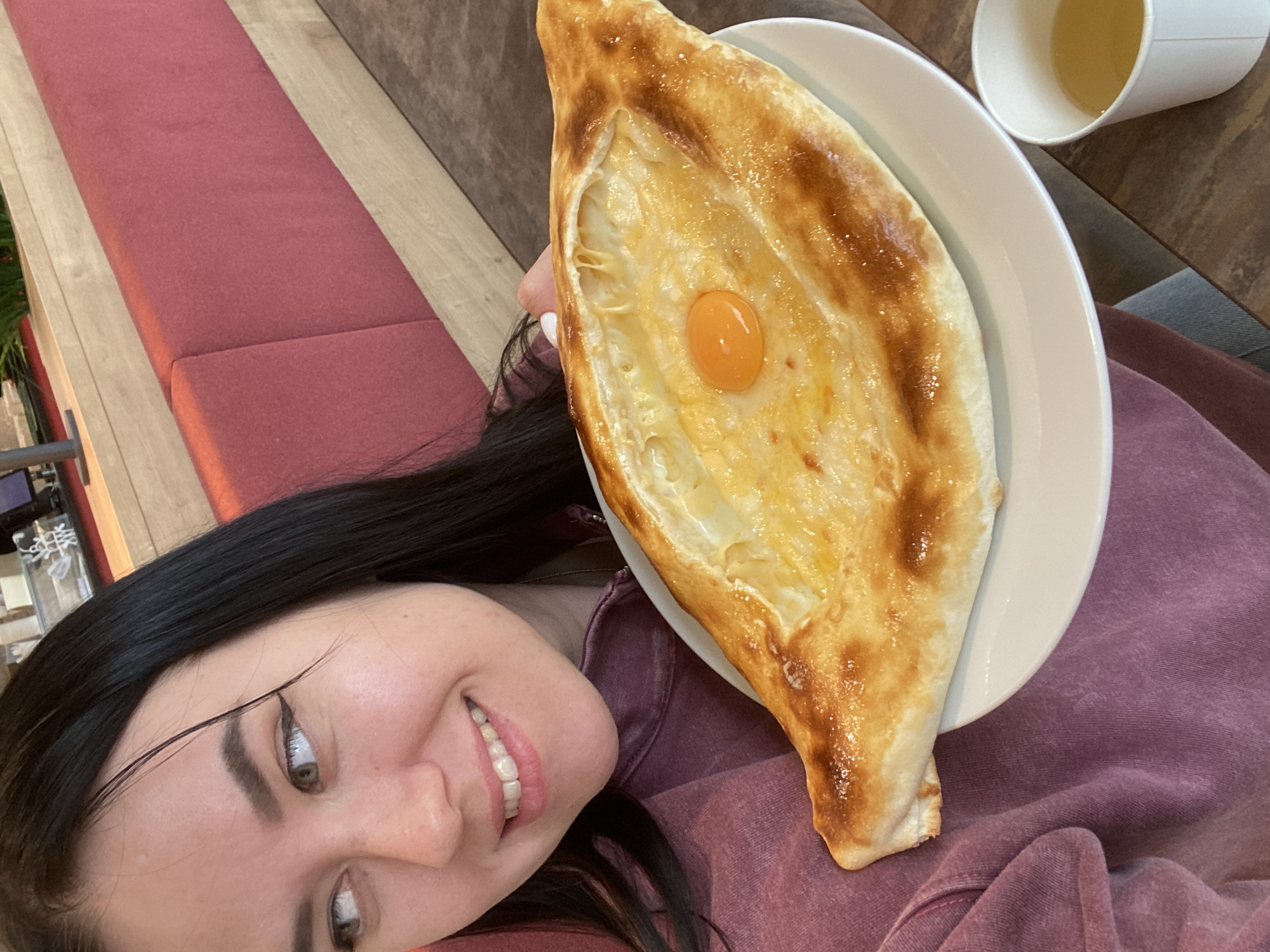 Woman documents gallery visit and Georgian meal in Perm