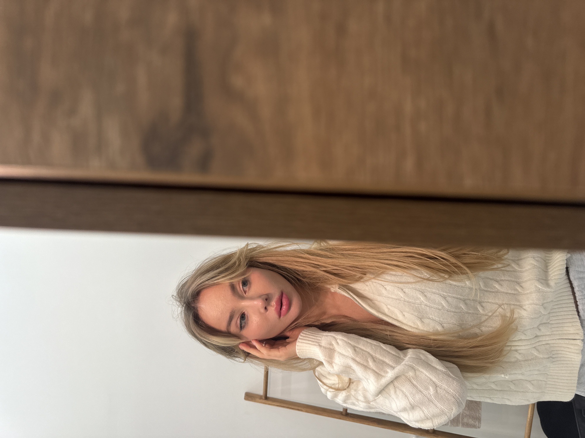 Woman photographed on blue bedding in Moscow apartment