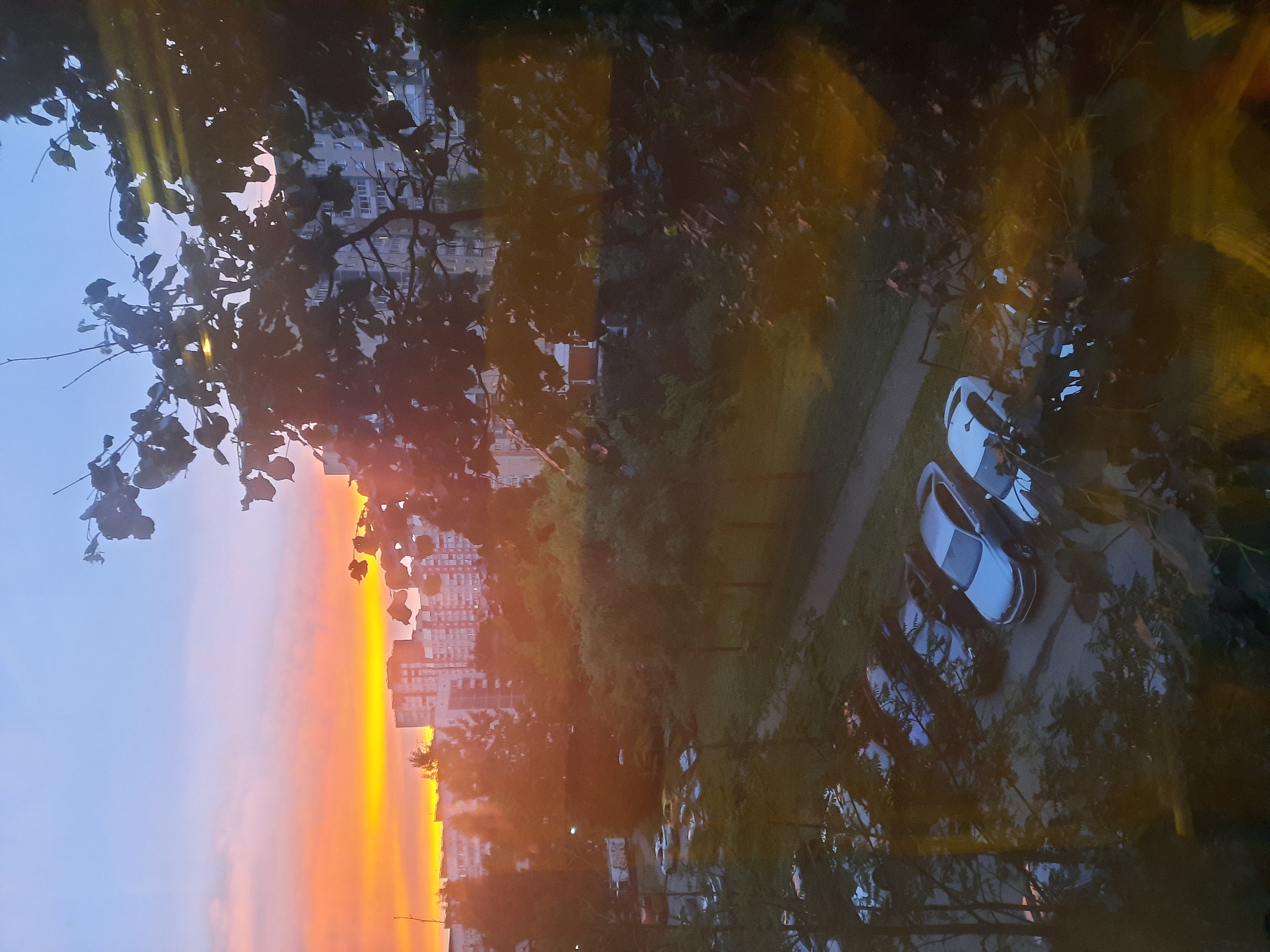 St. Petersburg skyline glows at dusk, orange fading to purple