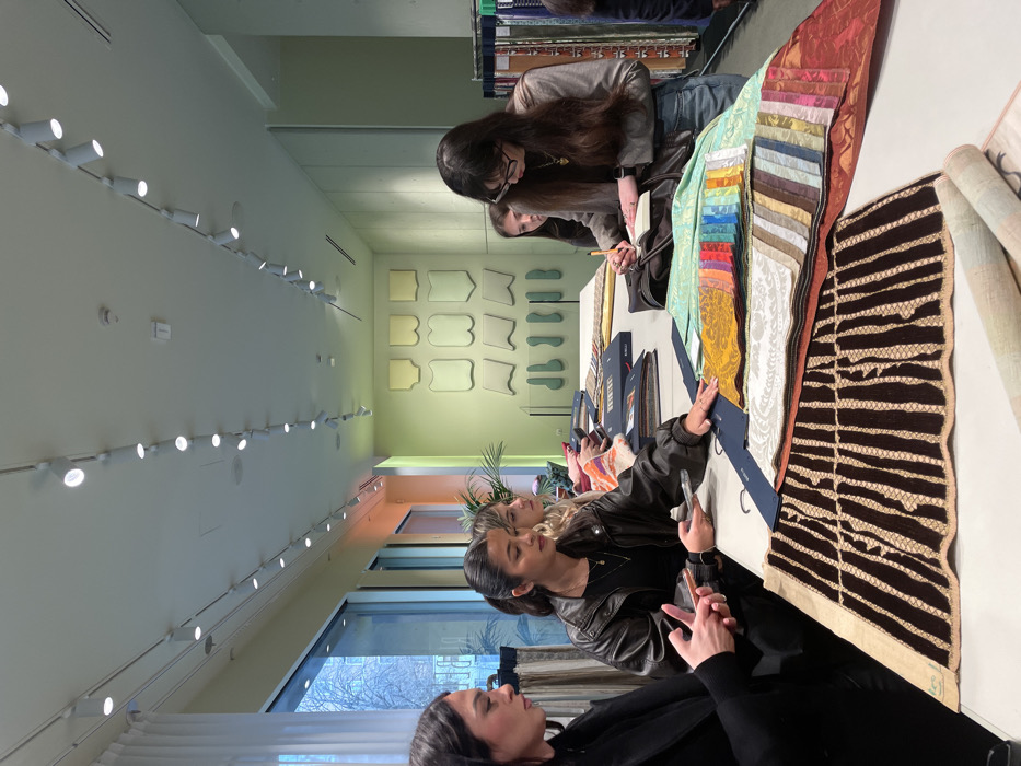 Design consultation observed at Milan textile showroom