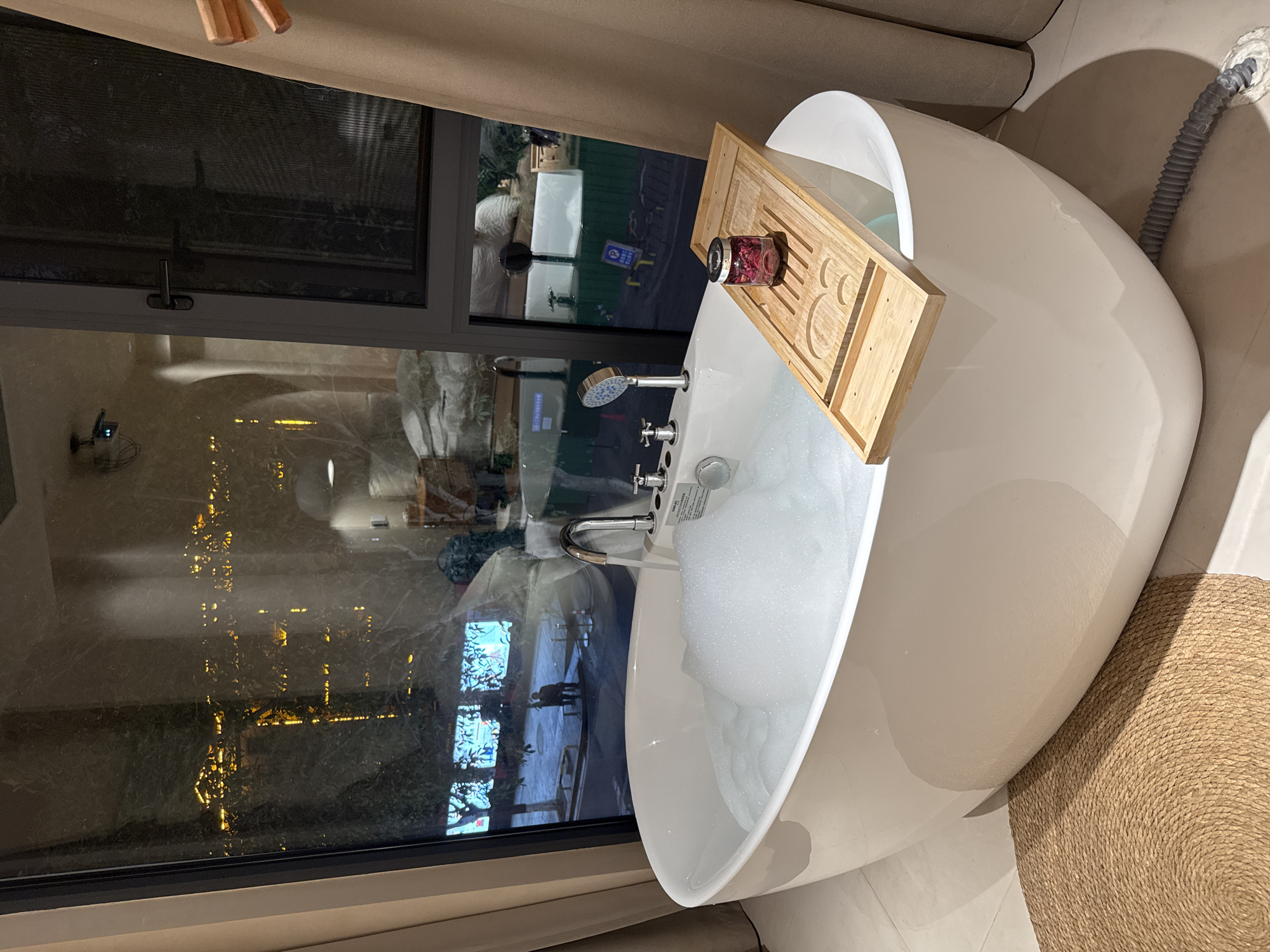 Rose petal bath preparation captured in Wulingyuan apartment