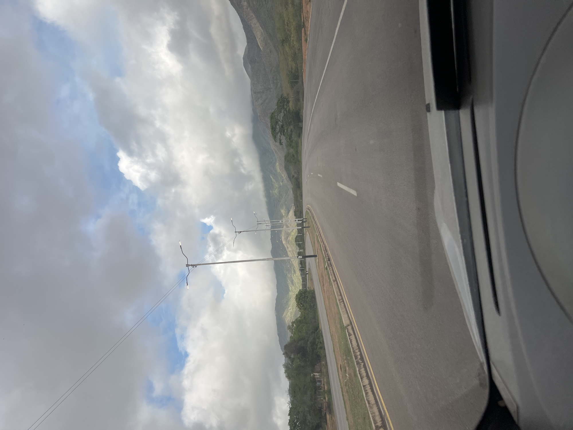 Driving through Santa Ana's highway with mountains ahead