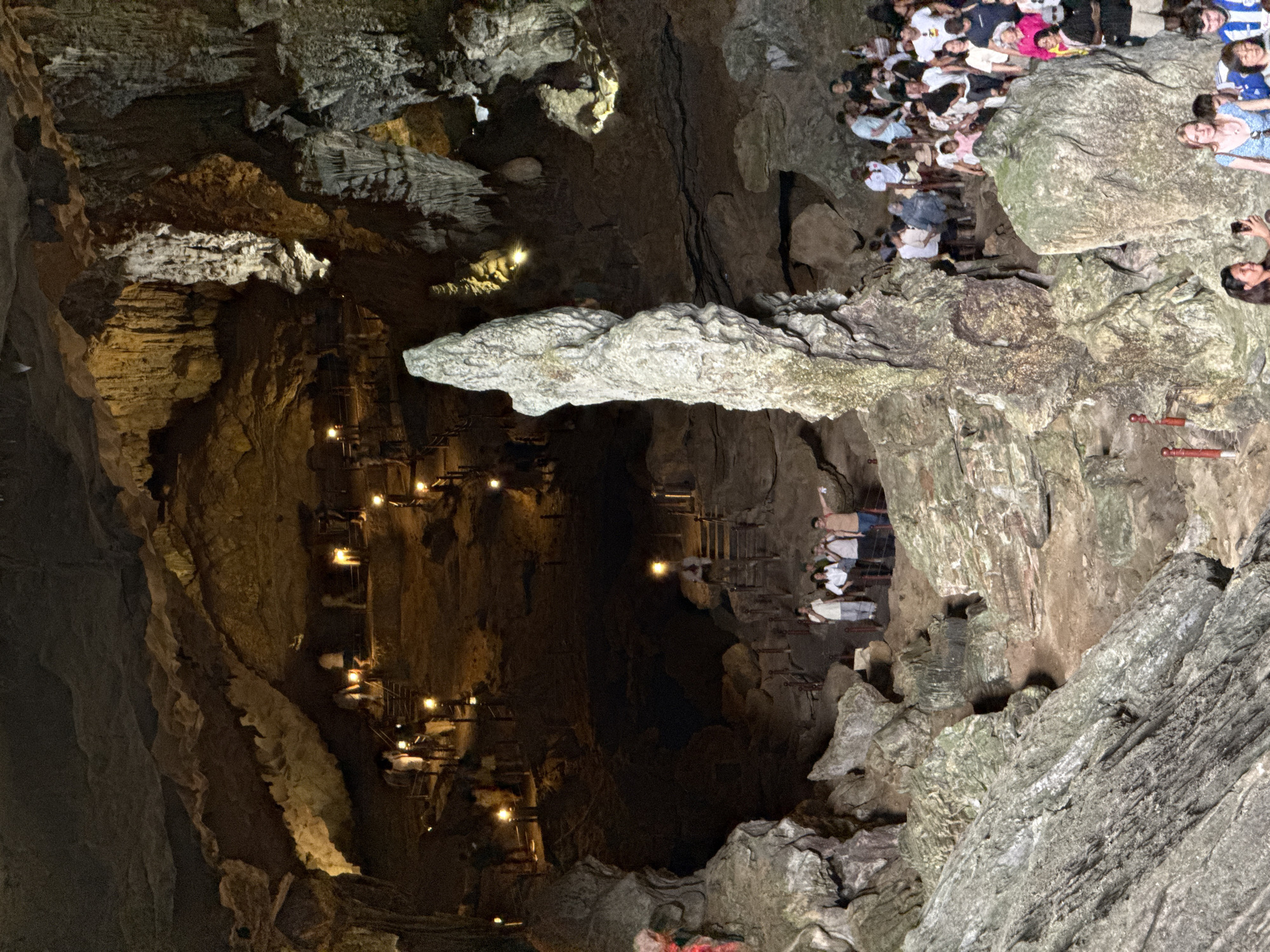 Tourist activity documented at Ha Long Bay cave and waterway