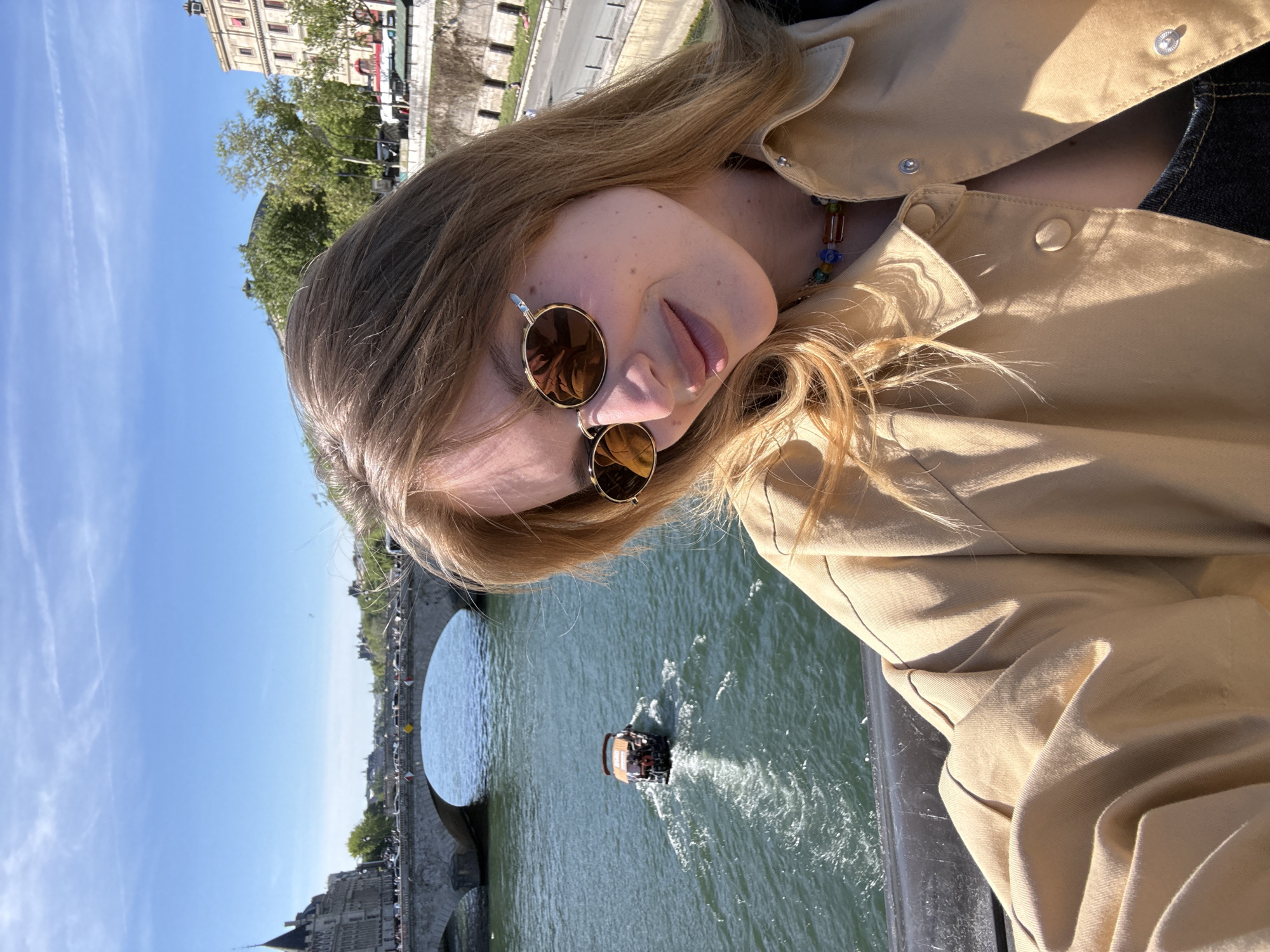 Young woman photographed on sunny afternoon in Paris