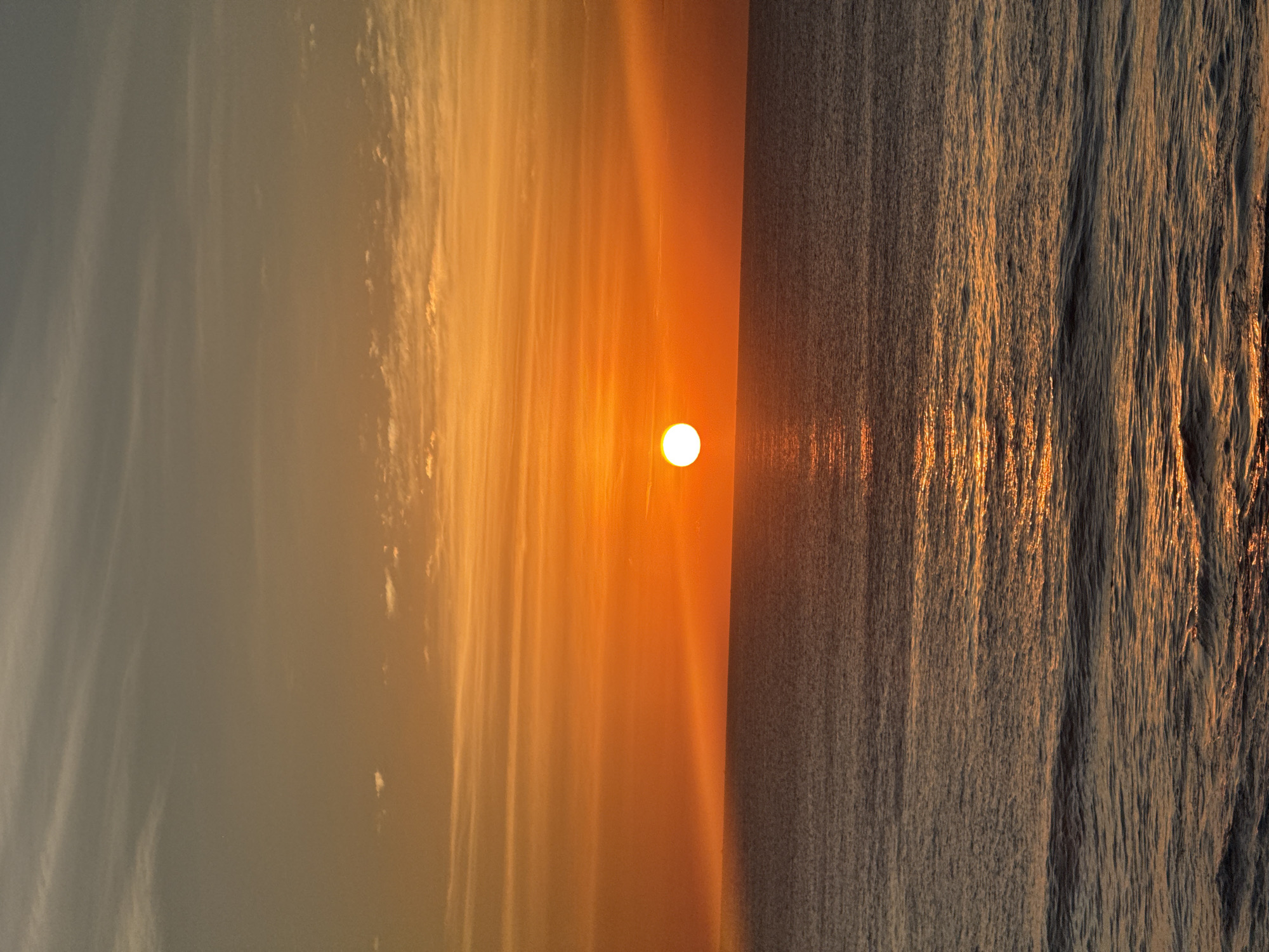 Beach day fades into a warm Bali sunset