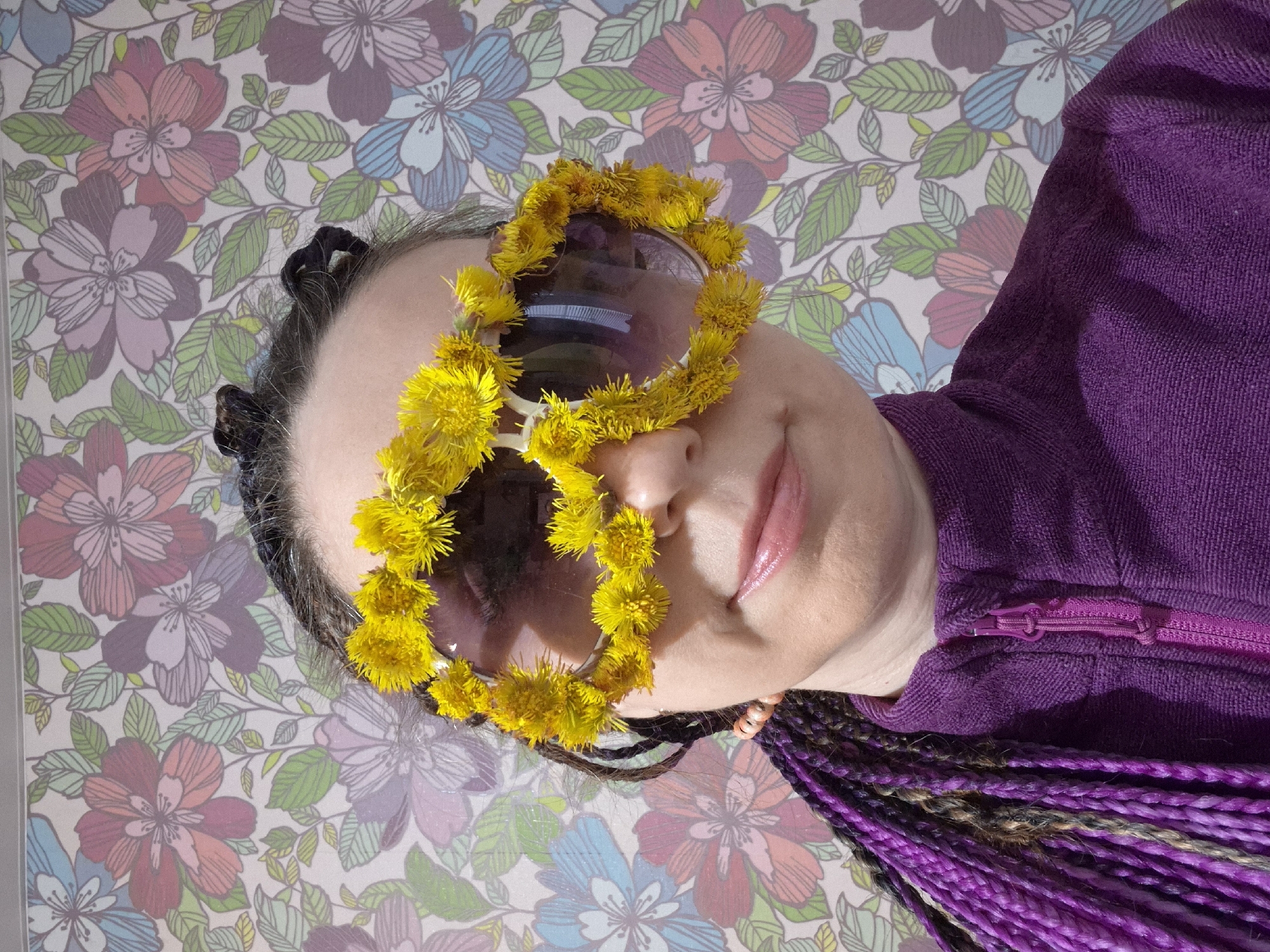 Person with colorful braids photographed in casual portrait session