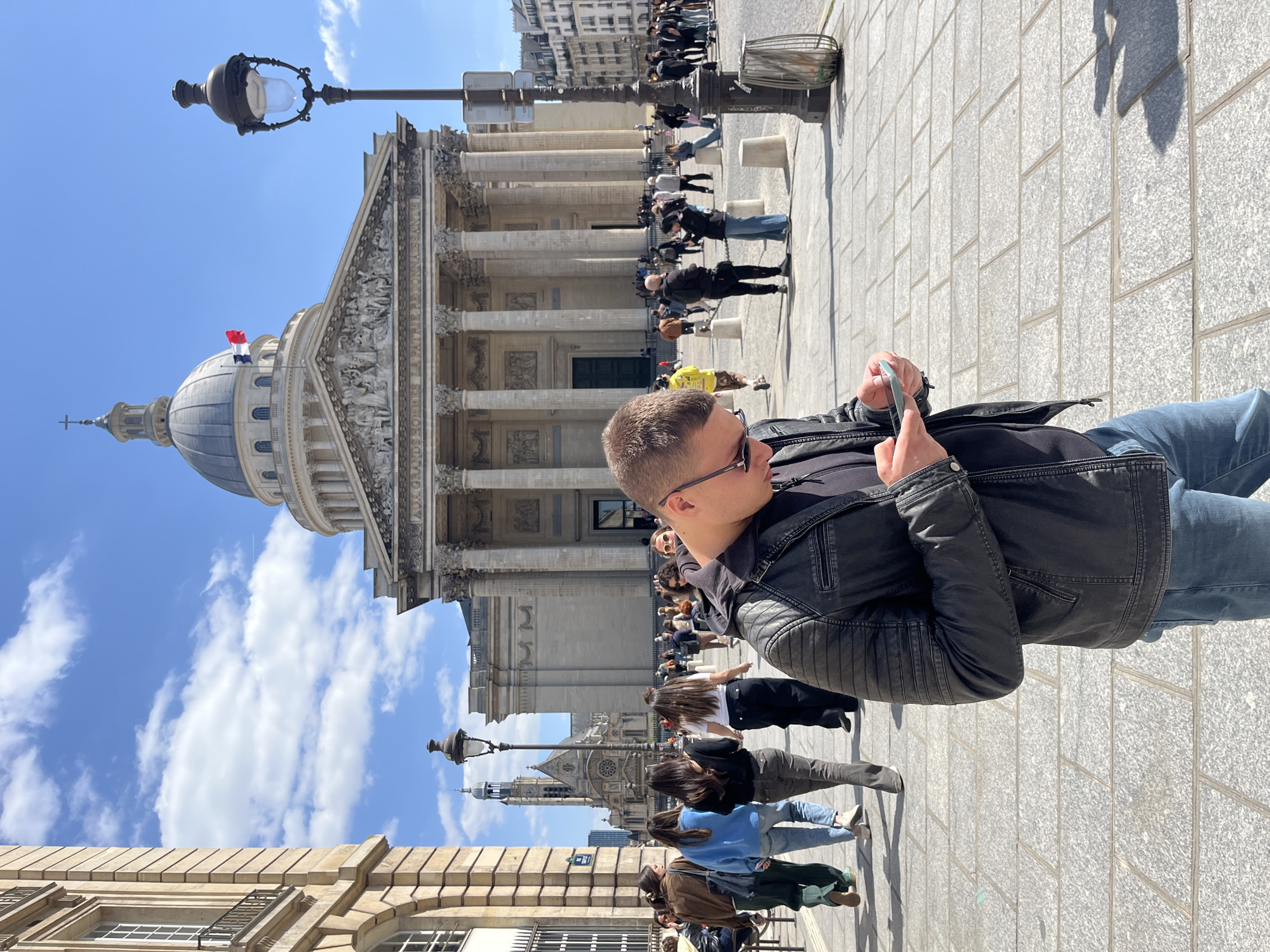 Man spotted in sunny Paris street scene