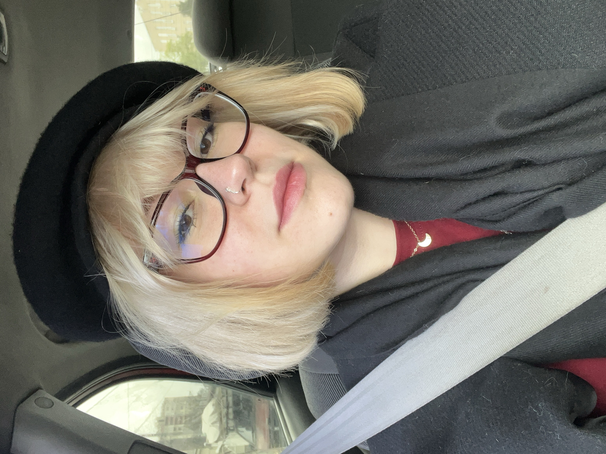 Young Woman Takes Selfie in Car in Odesa