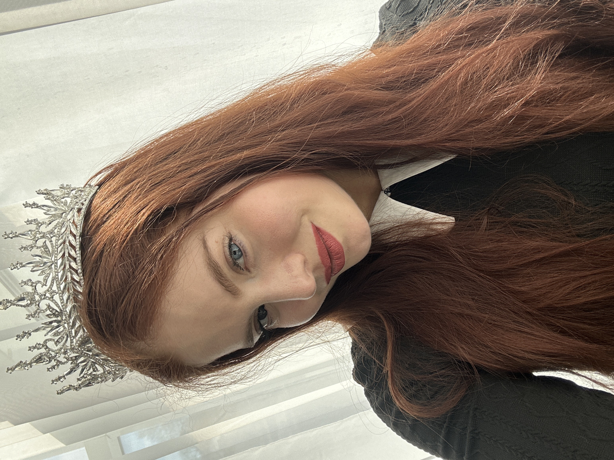 Portrait photograph captured in Riga shows woman with reddish hair