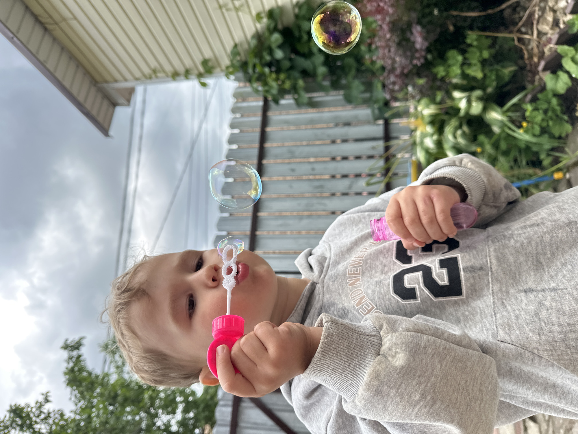 Backyard bubble play in a Nizhny Novgorod garden
