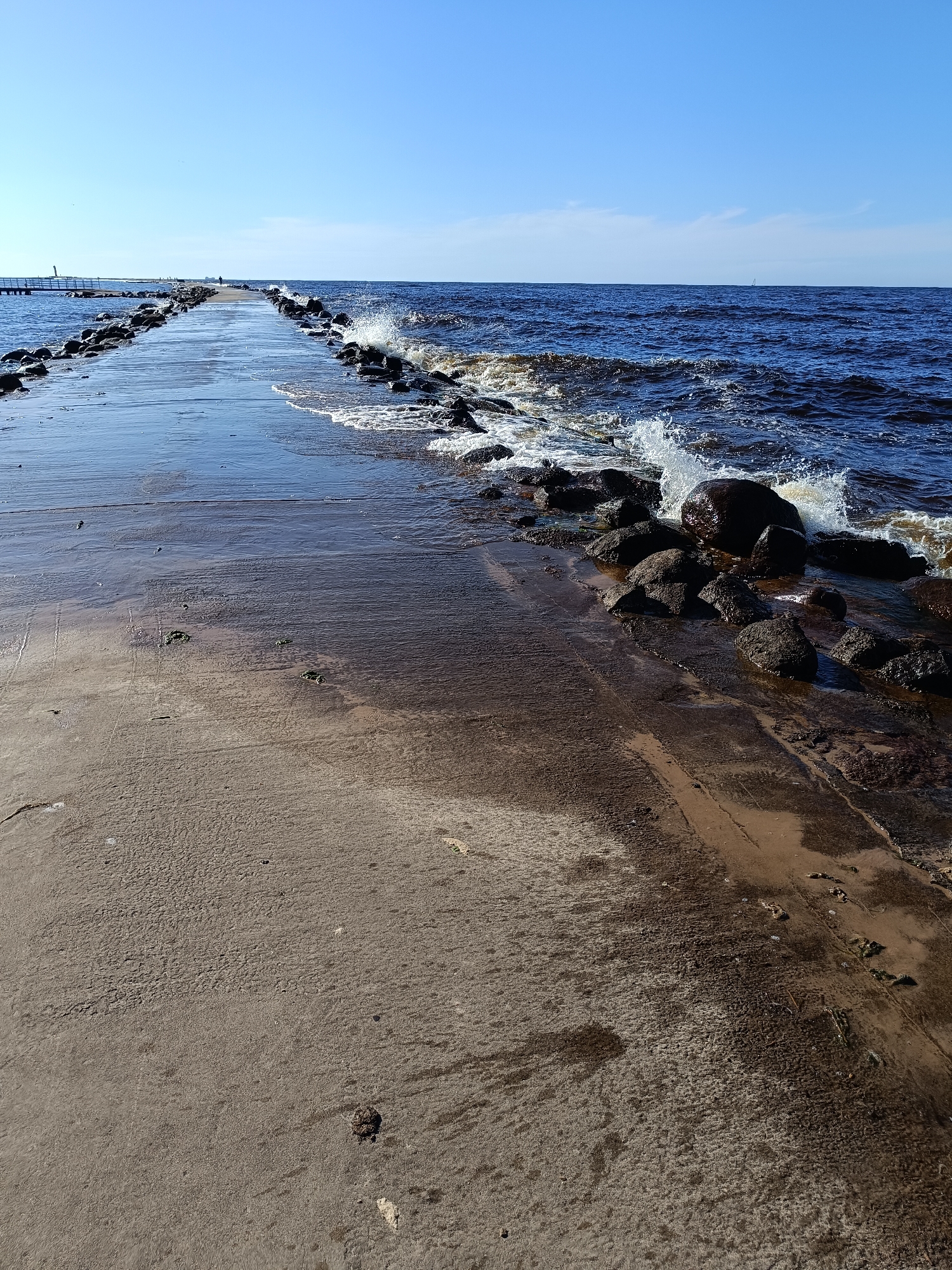 Sunny afternoon along Riga's Baltic pier and shoreline
