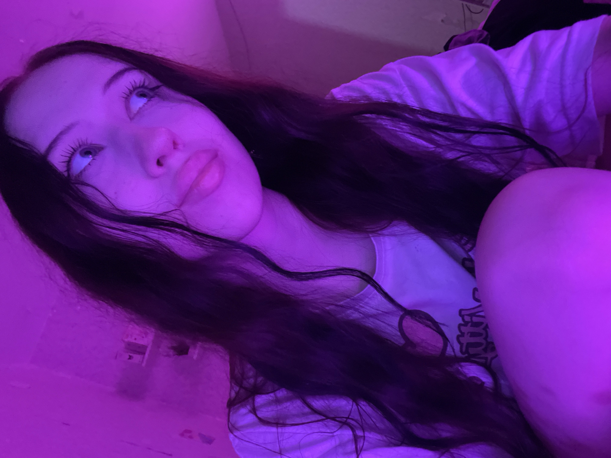 Purple-lit selfie session with pink roses, Votkinsk