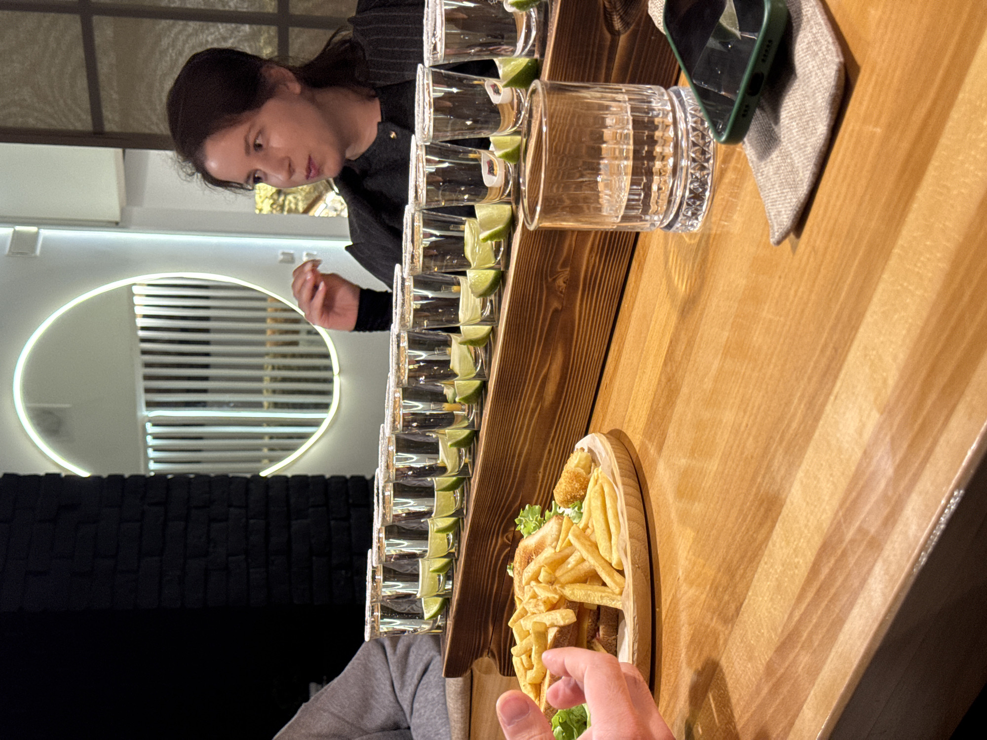Evening social gathering documented at Sokhumi restaurant with tequila shots