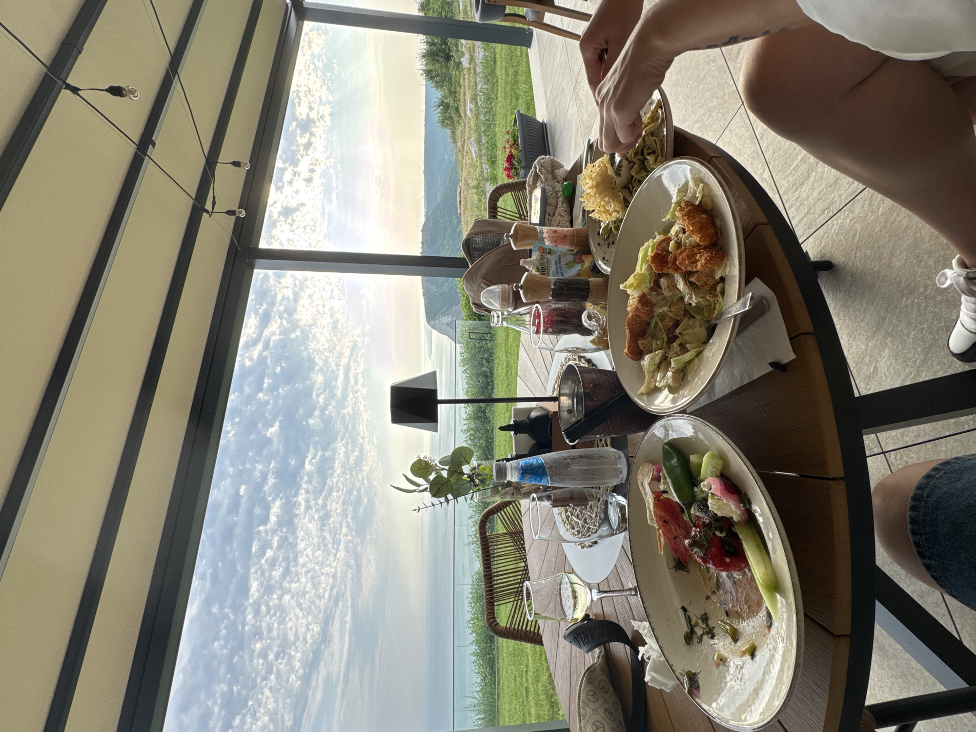Pesto pasta lunch on a cliffside patio in Kavarna