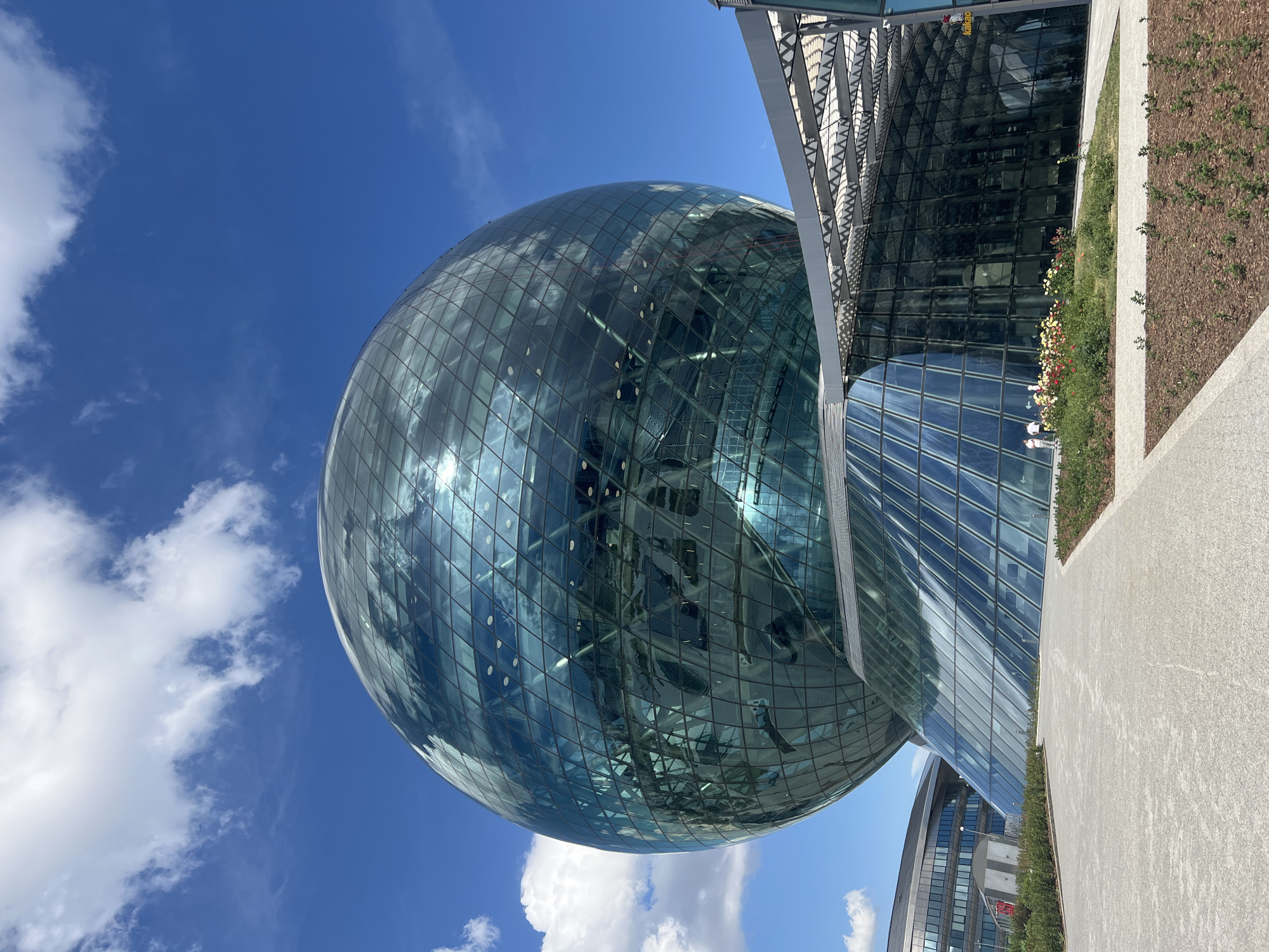 Visitors document Astana's iconic glass sphere pavilion complex