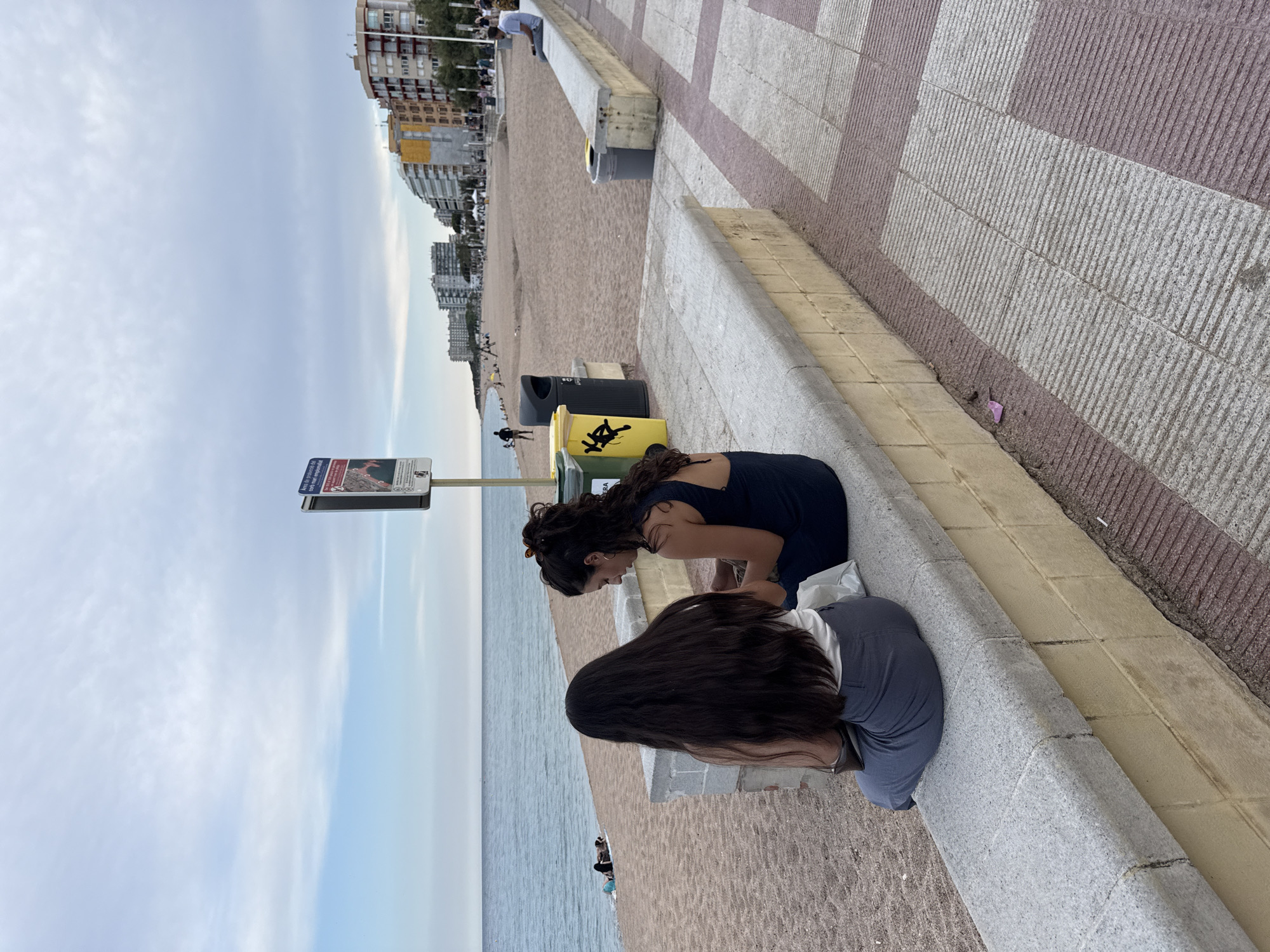 Summer afternoon across Blanes beach and waterfront promenade