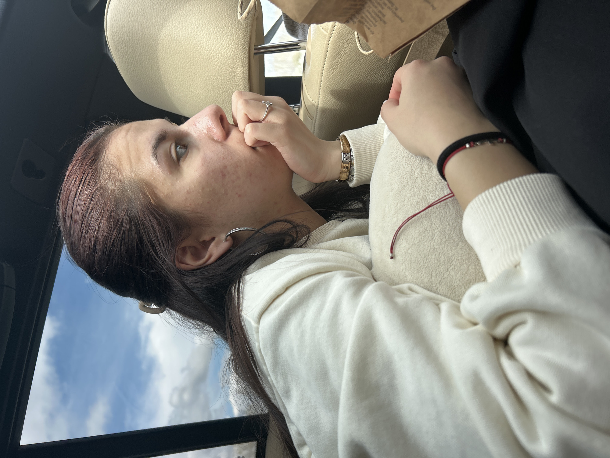 Woman in white sweatshirt observed in vehicle in Kaloyanovets