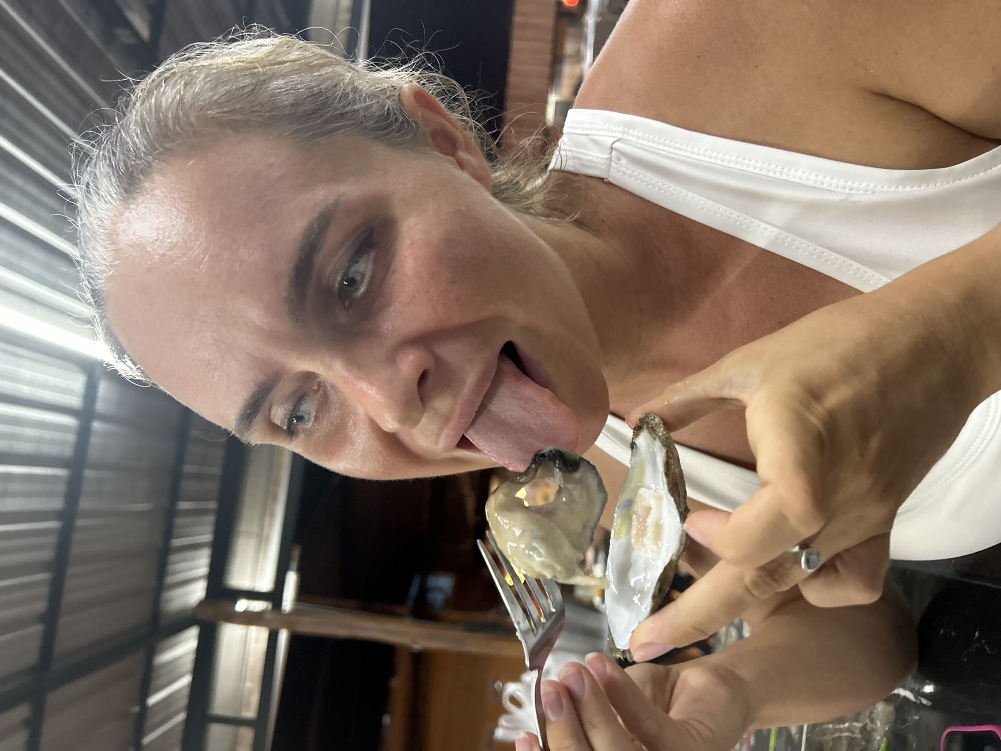 Oysters and coconut drinks at a Ko Samui outdoor restaurant