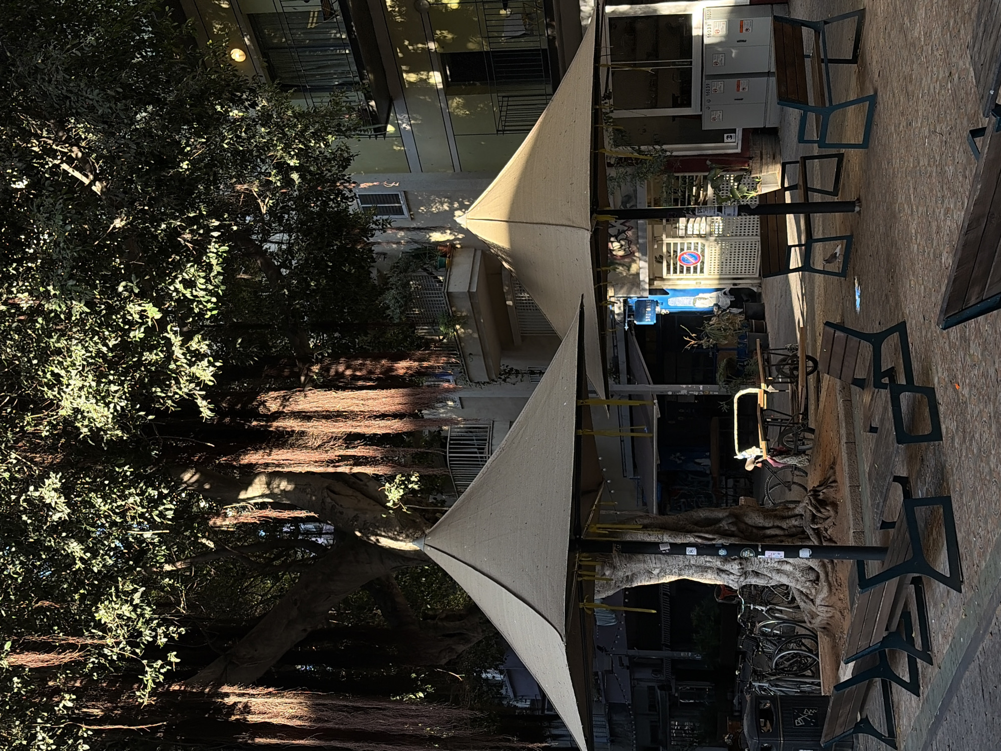 Tel Aviv outdoor seating area documented amid urban setting