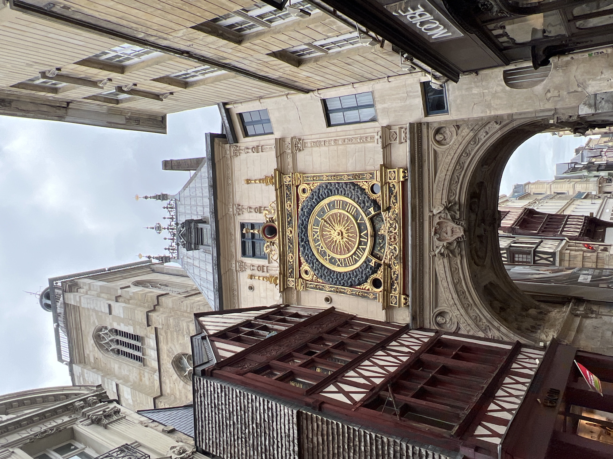 Tourist captures historic Rouen landmarks and antique markets