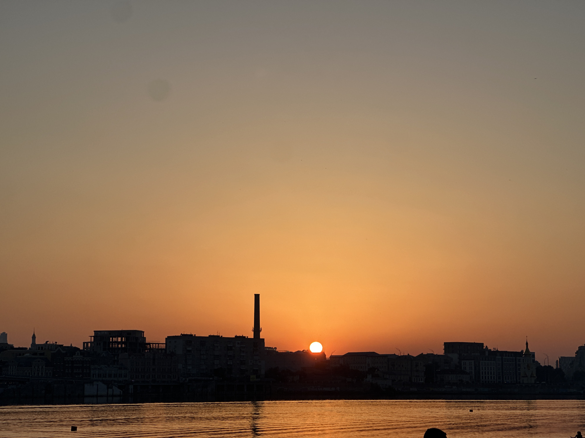 Kyiv's Dnipro River at golden hour, summer 2026