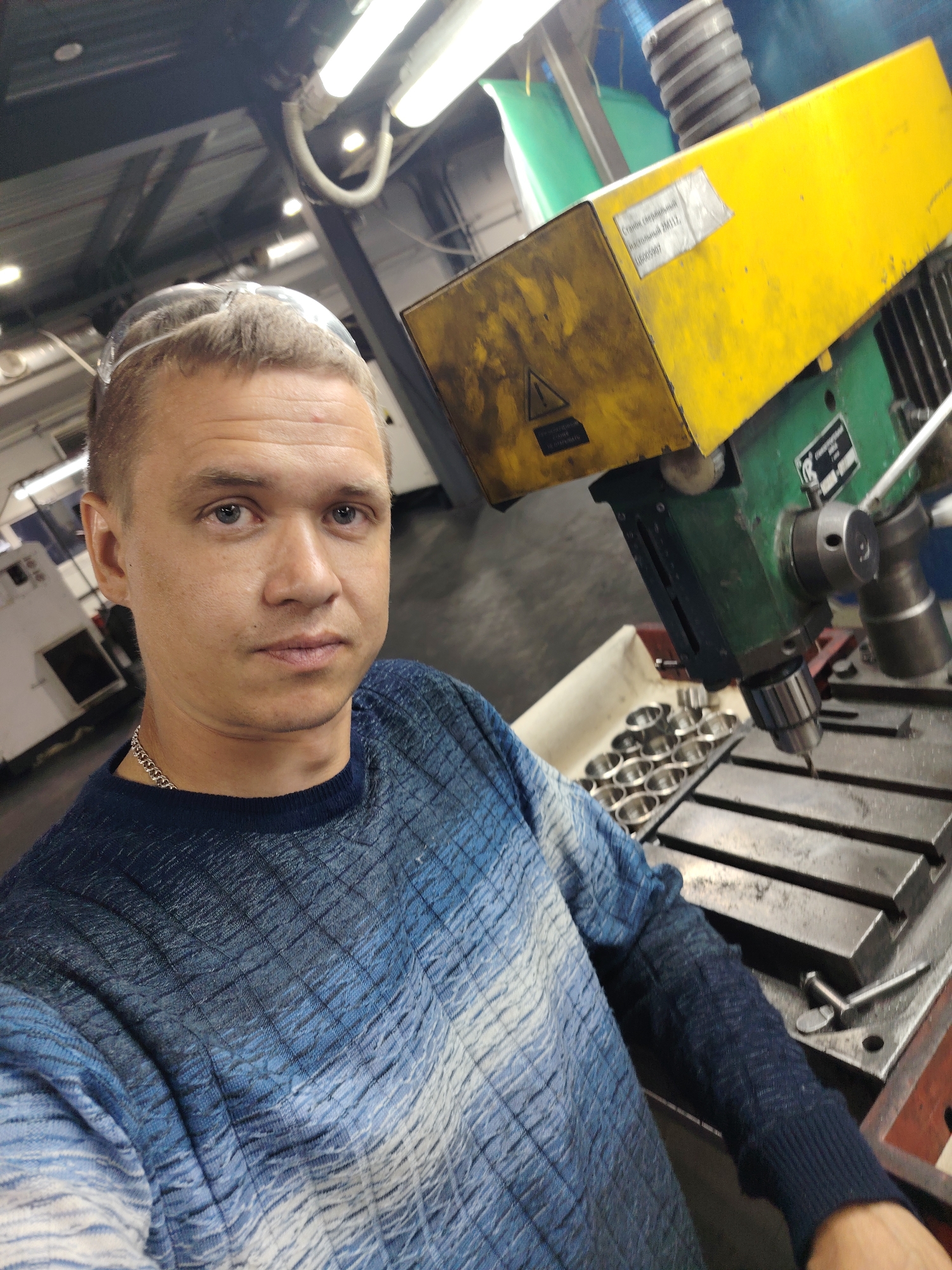 Worker Takes Selfie in Russian Industrial Workshop
