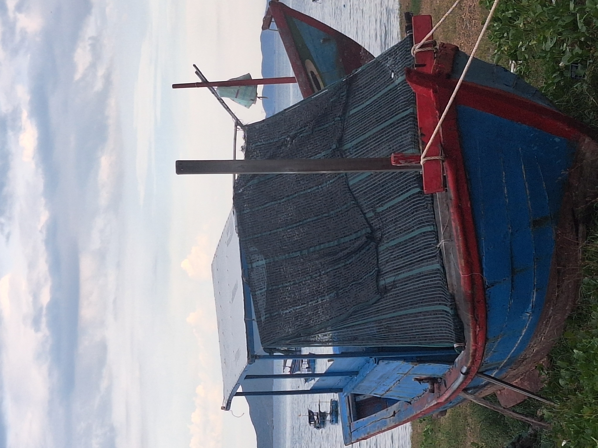 Nha Trang beachfront life: boats, bathers, and coastal streets