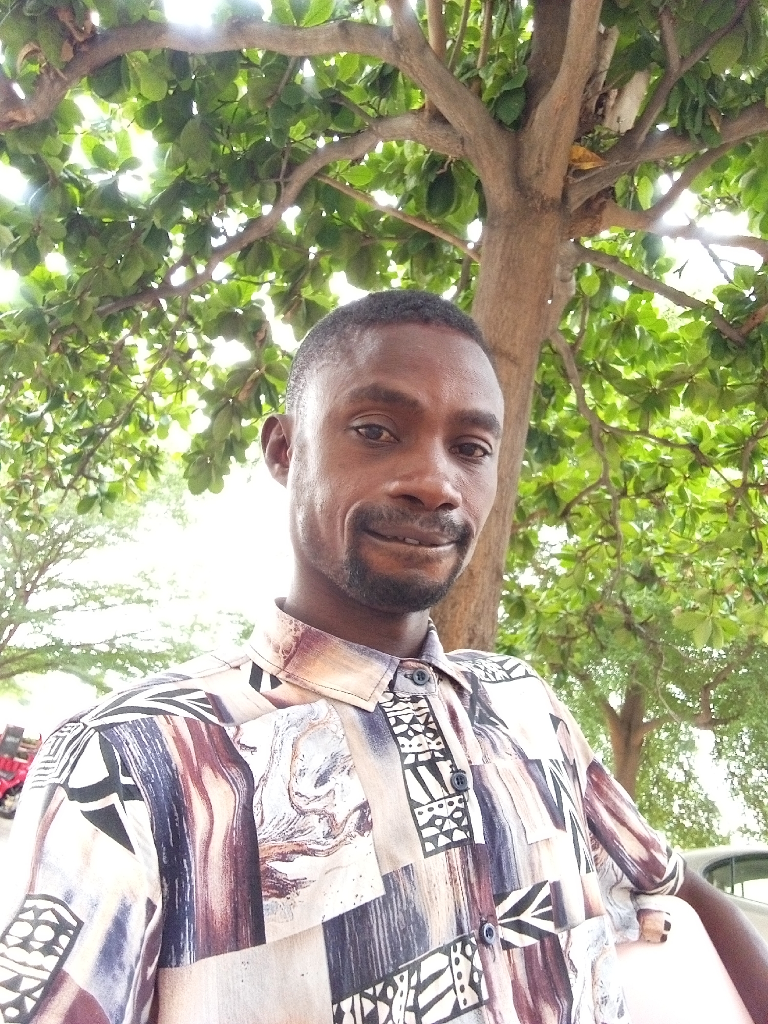 Men gather for casual Easter socializing in Lokoja, Nigeria