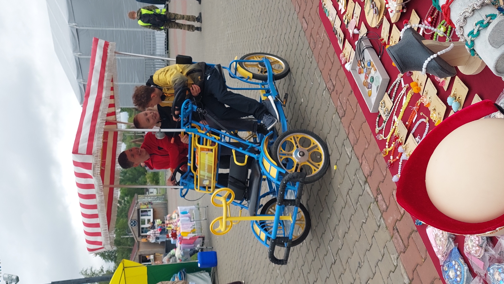 Handmade jewelry market on a brick plaza in Komsomolsk-on-Amur
