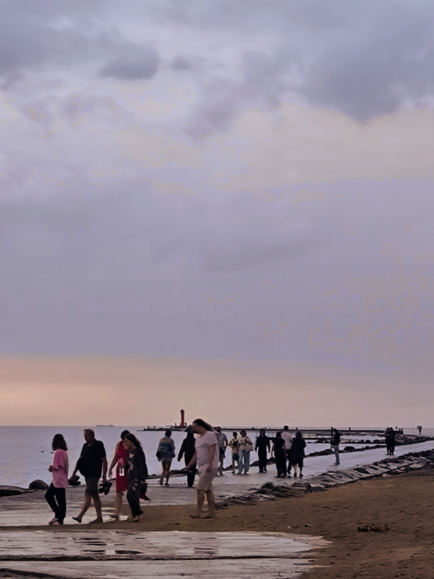 Dusk along Riga's pier and shoreline, water and soft light.