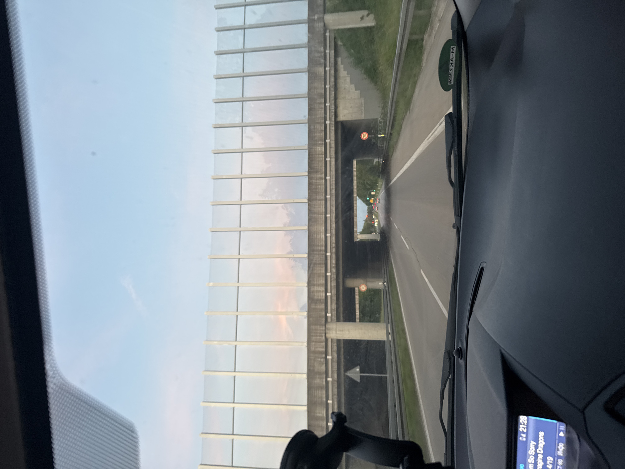 Evening highway drive through the Munich suburbs